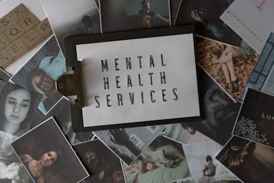 clipboard with mental health services written on it