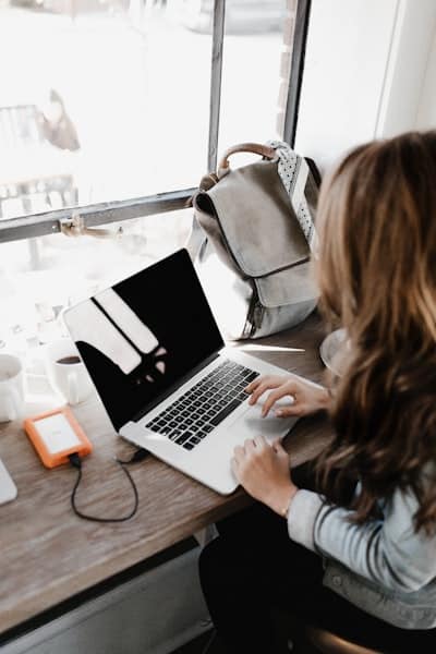 college woman on laptop