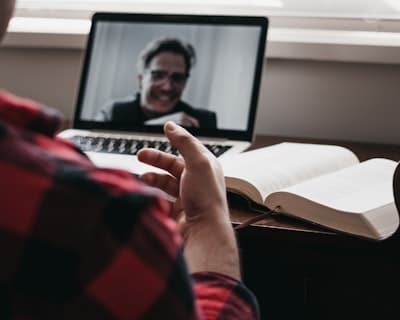 an individual having a conversation over video